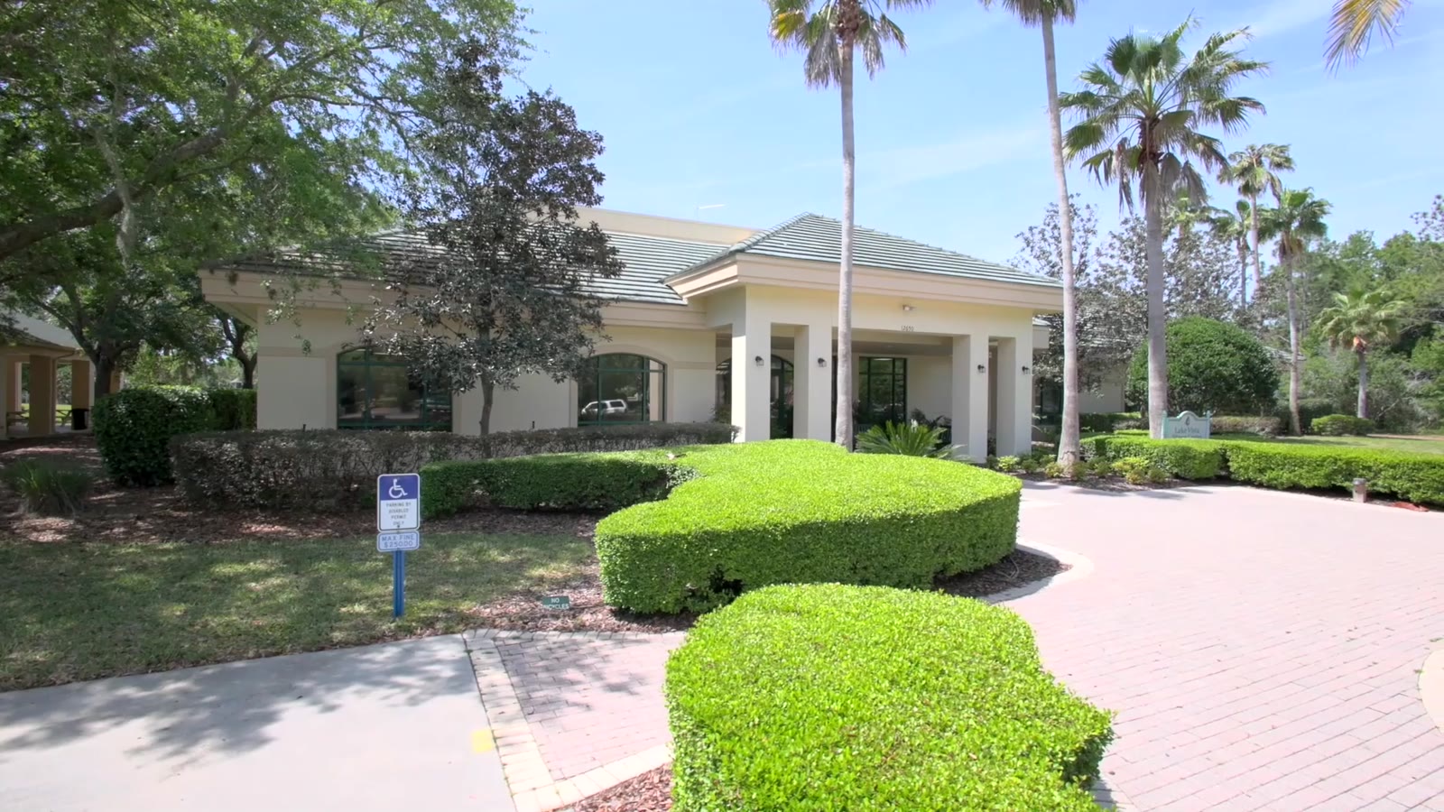 Clubhouse and landscaped grounds at Del Webb Spruce Creek